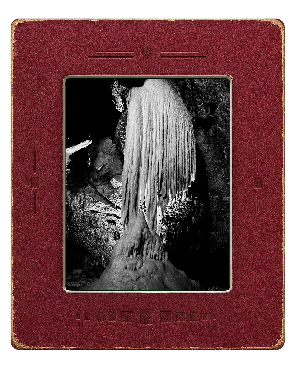 Lit cave formation photograph developed with Noir Rangefinder in the Archive Slide frame
